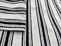 Detailed macro view showing the soft texture of black and white striped chenille jacquard fabric - Classic Black and White