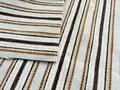Macro detail showing the soft texture of brown and beige striped jacquard chenille fabric - Yellow And Coffee