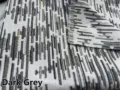 Detailed macro view of dark grey chenille jacquard fabric with abstract pattern - Dark Gray