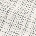 Detailed macro view of black and white plaid tweed fabric with tiny metallic sequins - Black And White Plaid (815-5)