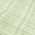 Close-up of green plaid tweed fabric with shimmering silver sequins for elegant apparel - Light Green Plaid (815-7)