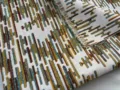 Dettaglio del tessuto jacquard in ciniglia con motivo a strisce astratte giallo arancio grigio - Giallo Arancio