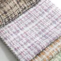 Close-up of premium checkered chenille fabric with soft tweed texture for clothing - Plaid Style (216-7)