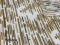 Close-up of chenille jacquard fabric with yellow and brown abstract pattern - Yellow