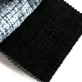 Macro-detail van zwarte chenille en blauwe plaid tweed stoffen voor kleding en kussens - Ruit Stijl (216-27)