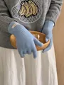 Detail of blue 100% Merino wool knitted gloves with a classic ribbed cuff design - One Size / Baby Blue