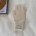 Soft beige knitted winter gloves for women with decorative wrist logo patch detail - One Size / Off White