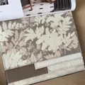 Close-up of French retro jacquard fabric with brown and cream leaf pattern for home decor. - Sofa Fabric / 中古繁枝奶茶色