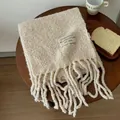 Thick cream wool scarf with long tassels and brand label, warm winter knitted neck wrap - Beige