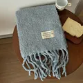 Cozy thick textured light gray wool scarf with decorative tassels and brand label - Light Gray
