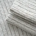 Detailed macro shot of thickened chenille fabric with mountain texture in beige. - 2608-5米杏肌理