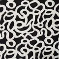 Detailed macro shot of chenille woven jacquard fabric with abstract black and white patterns - Black Background Jacquard Style (Jacquard-2)
