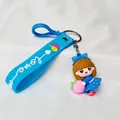 Adorable cartoon girl holding a peach silicone keychain with blue strap and 'Love' text - Blue