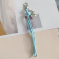 Porte-clés à pampilles en cordon de cire bleu ciel avec breloque cœur en argent - Bleu