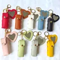 Étui à rouge à lèvres en cuir portable avec porte-clés miroir cœur en plusieurs couleurs - Couleurs Mélangées Aléatoires
