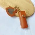 Porte-clés étui à rouge à lèvres en cuir caramel avec charm de mini miroir en forme de cœur - Marron