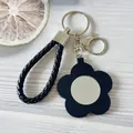 Porte-clés fleur en cuir noir avec mini miroir et lanière tressée élégante pour sac - Noir