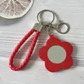 Elegante portachiavi a specchio a forma di fiore in pelle rossa con cinturino intrecciato - Rosso