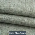 Gros plan sur la texture d'un tissu de canapé en lin épais de couleur cyan clair - Cyan Clair