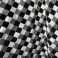 Detailed view of black and white checkerboard chenille jacquard fabric for upholstery - Checkered / Black White Grey