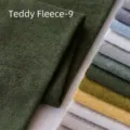 Premium thick olive green teddy fleece fabric swatch shown with multi-color sample stack - Moss Green