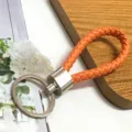 Handmade orange braided leather keychain with silver metal ring for car keys or bags - 50 Pieces/Pack / Orange