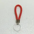 Braided leather keychain in vibrant red with silver metal ring for car keys and bags - 50 Pieces/Pack / Red