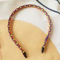 Slim colorful braided leather headband featuring vibrant red blue and yellow weave design - Red Blue Yellow Mix