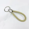 Elegant hand-braided beige leather keychain featuring a polished silver metal ring - 50 Pieces/Pack / Khaki