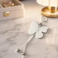 Elegant white leather butterfly bag charm with silver bead accents and ring clasp - White