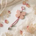Cute macaron pink PU leather butterfly keychain charm for backpack and bag decor - Pink