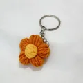 Porte-clés fleur soufflée orange crocheté à la main pour sacs et cadeaux - Orange
