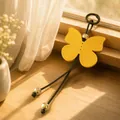 Handcrafted yellow PU leather butterfly keychain with golden beads for backpack decoration - Yellow