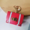 Retro red leather mini bag keychain with gold hardware and white stripes - Red
