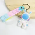 Portachiavi astronauta coniglio spaziale cartone animato con cinturino pop-it pastello - Blu