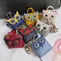 Ensemble de porte-clés mini sacs chouette mignons en couleurs variées et texture cuir - Couleurs Mélangées Aléatoires