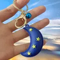 Porte-clés mignon lune bleue et étoiles avec clochette et fermoir doré - Style Lune Avec Cloche