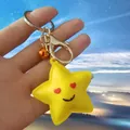 Mignon porte-clés étoile jaune de dessin animé avec yeux en coeur et pendentif cloche orange - Style Étoile Avec Cloche