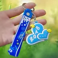 Vue détaillée d'un porte-clés en silicone bleu 3D avec ruban décoratif imprimé - Sangle Cœur Bleu