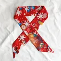 Detail shot of red Christmas silk ribbon with Merry Christmas print and snowflakes. - Christmas Scarf 1