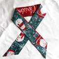 Macro view of Christmas themed silk scarf featuring Santa and Snowman print patterns - Christmas Scarf 3