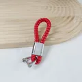 Red braided PU leather car keychain featuring a stylish silver horseshoe buckle design - Red
