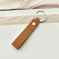 Llavero minimalista de cuero PU marrón con anilla de metal dorado y remache sólido - Marrón