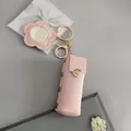 Porte-clés étui à rouge à lèvres en cuir rose avec miroir de maquillage en fleur - Sac à Rouge à Lèvres Avec Miroir / Rose