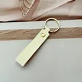 Llavero minimalista de cuero PU amarillo pálido con anillo dorado para coche - Beige