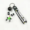 Close-up of cute cartoon panda keychain with Good Luck PVC strap and black bell charm - Cartoon Strap (Black Bell)