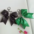 Porte-clés à nœud pailleté étincelant avec accents de strass noir et vert pour sacs. - Couleurs Mélangées Aléatoires