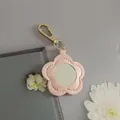 Portable pink PU leather flower-shaped keychain featuring an integrated makeup mirror - Pink-Gold Buckle