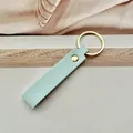 Llavero de cuero PU azul menta 1.6x11cm con anillo dorado para llaves de coche y bolsos - Azul