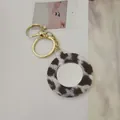 Porte-clés miroir rond avec motif léopard et fermoir doré élégant - Style Rond / Gris